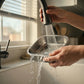 Rinsing the removable UAHPET stainless steel feeder bowl