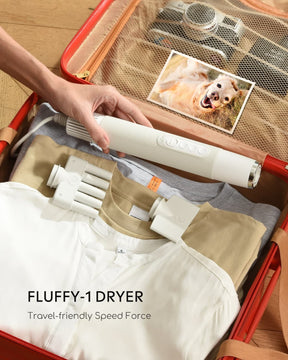 travel-friendly size of fluffy-1 dryer in the suitcase